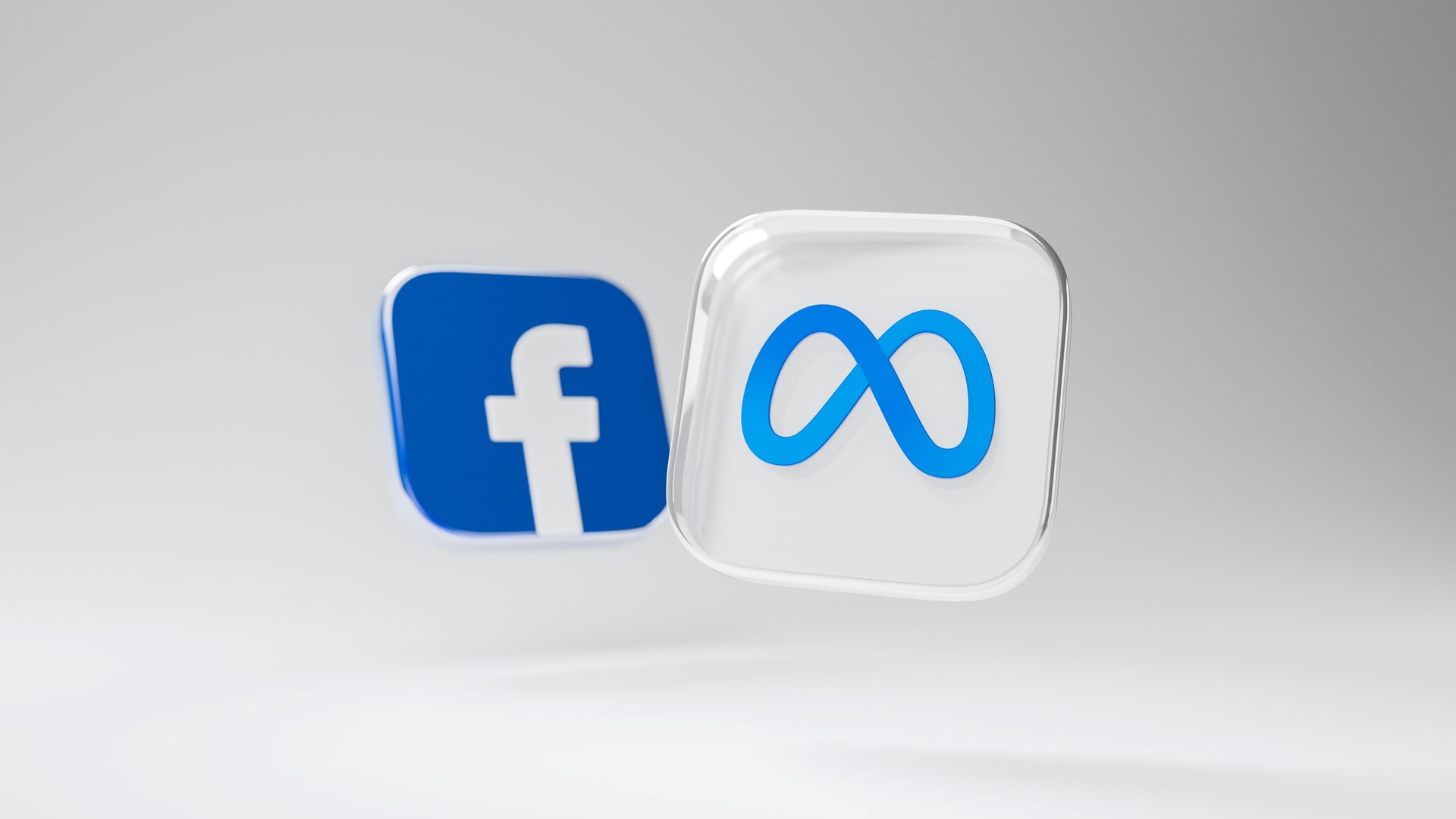 A logo of Facebook and Meta